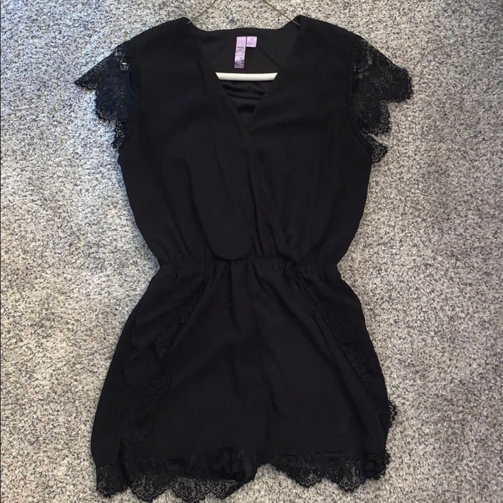 Black boutique romper with lace